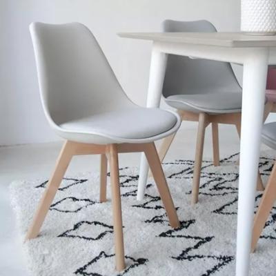 SILLA EAMES ON ASIENTO TAPISADO